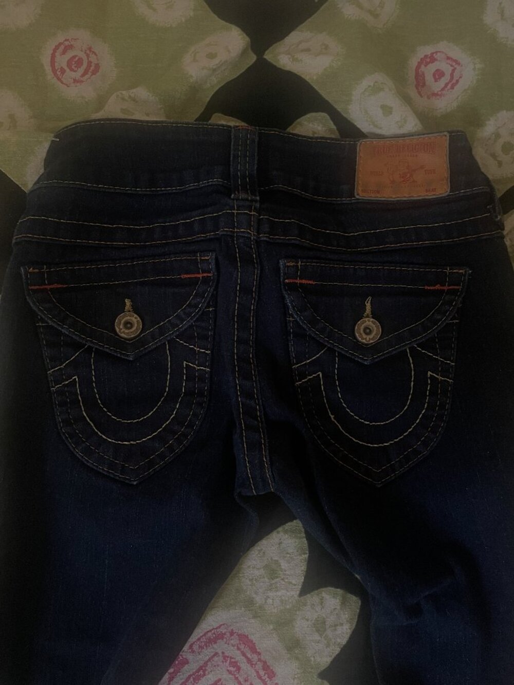 - True Religion low rise jeans
